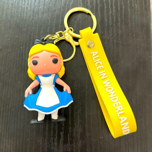 Disney Accessories - Disney Alice in Wonderland silicone keychain blue​